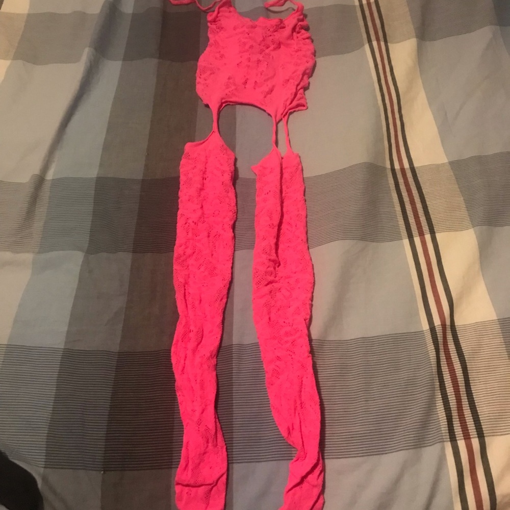 Bright pink Fishnet lingerie.